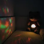 FreeOn Free2Play Soothing plush Teddy Bear with moving head, music and star projector