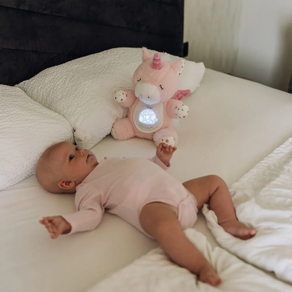 FreeOn Free2Play Soothing plush Unicorn with moving head, music and star projector